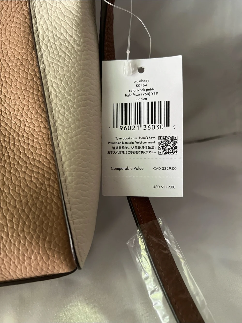 Kate Spade Pebbled Leather Crossbody Bag in Tan and White